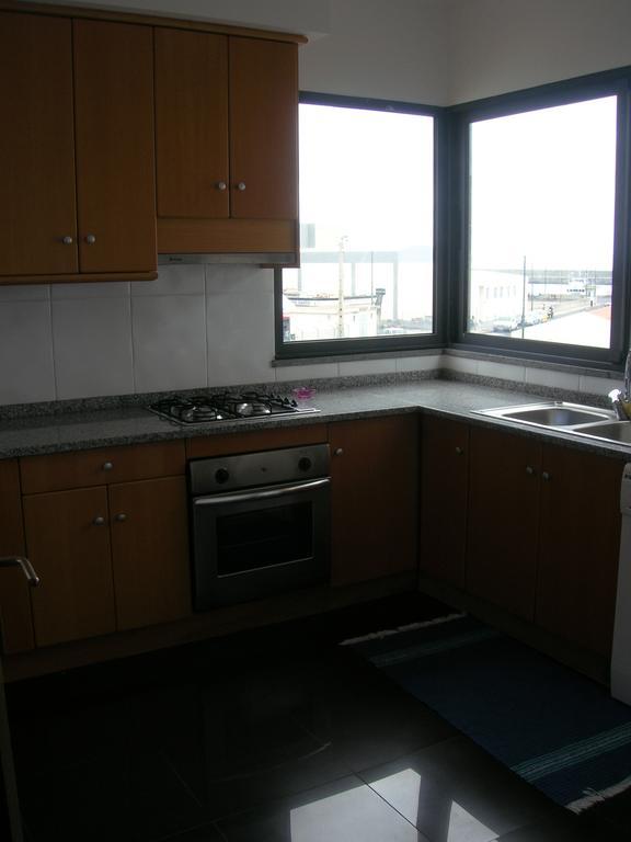 Apartamentos Amarelo Канисао Стая снимка